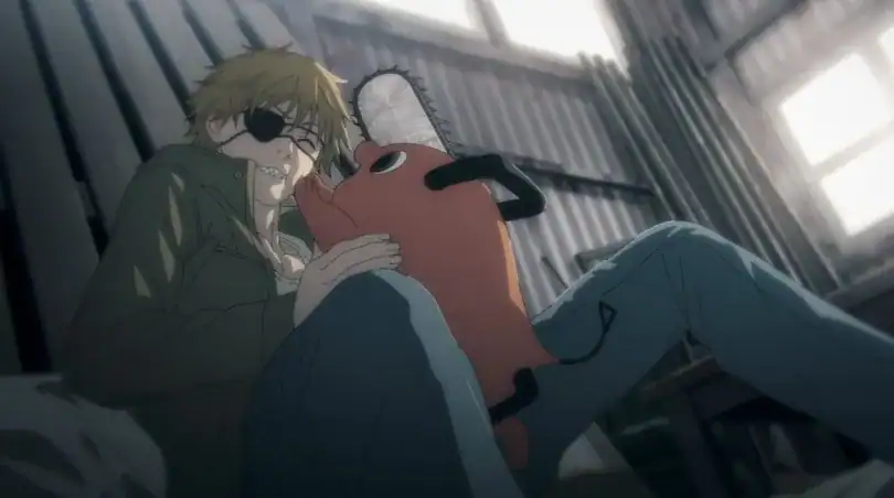 Un perro y una motosierra